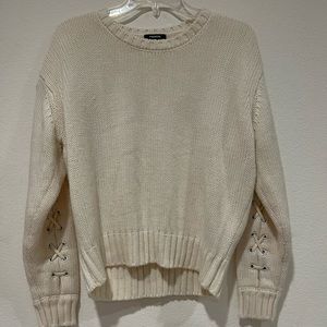 White Knitted Sweater With Braided Back